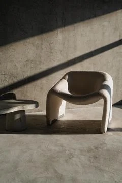 Loft interior design. Concrete table. Lights of a sun Stock Photos
