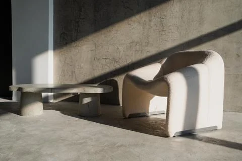 Loft interior design. Concrete table. Lights of a sun Stock Photos