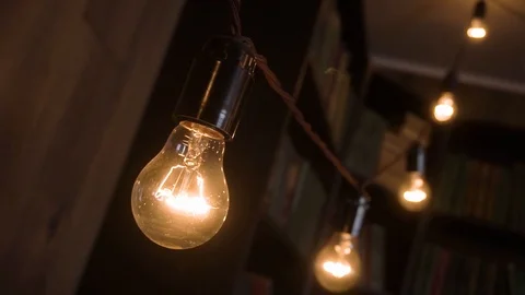 Loft lamps in the study. the orange lighting of the room. retro-style Vidéo 122287974