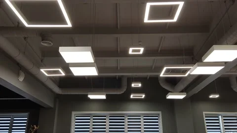 Loft lighting of the room. square office ceiling lights Stock Footage 155296727