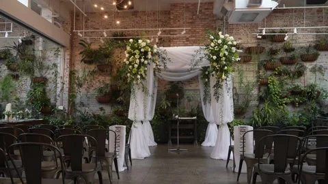 Loft Reception With Floral Decor, Elegant Wedding Scene Featuring Brick Walls Stock Footage 323780462