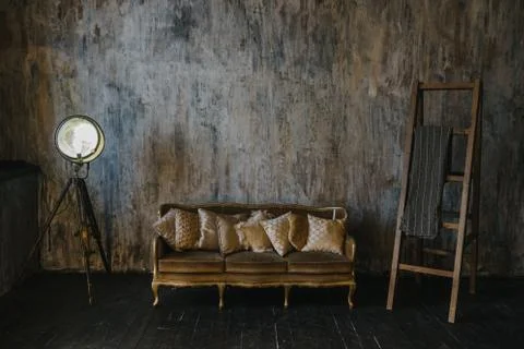 Loft style design. Texture wall. An old lantern. Wooden staircase Stock Photos