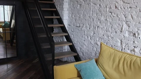 Loft-style staircase leading to a bunk bed Stock Footage 313656505