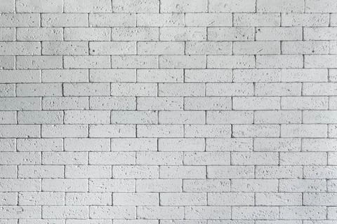 Loft styled white brick wall. Surface white wall of stone wall gray tones for Stock Photos