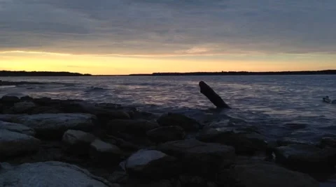 Log Bouncing in the Lake Waves Stock Footage 44966841
