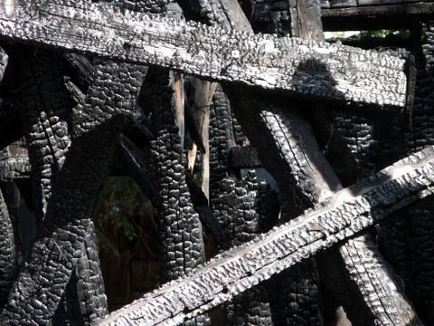Log burnt by fire Stock Photos