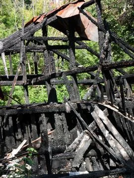 Log burnt by fire Stock Photos