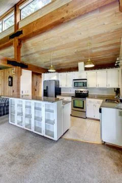 Log cabin house interior. kitchen room Stock Photos