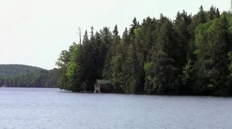 Log cabin on a lake Stock Footage 11503214