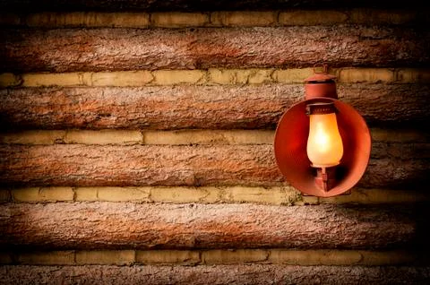 Log cabin with lantern Stock-Fotos