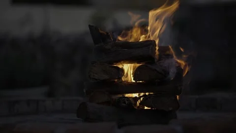 Log cabin method of building bon fire, flames burn from inside out Stock Footage 312323542