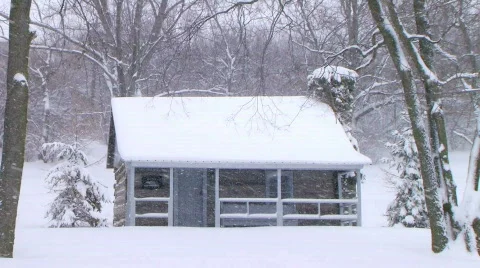 Log Cabin in Snow Stock Footage 112386