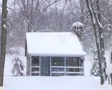 Log Cabin in Snow SD Footage