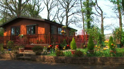 Log cabin in the woods Stock Footage 374496