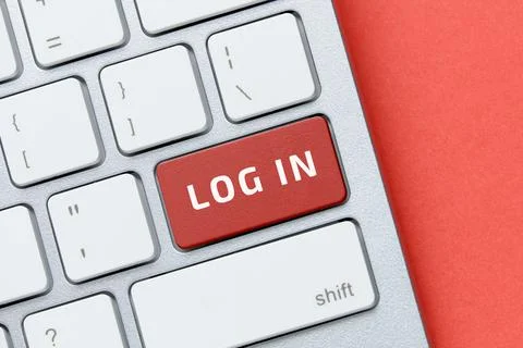 Log in concept on keyboard button. Close up Stock Photos