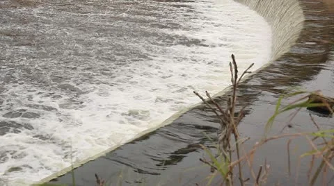 Log Going Over a Wier Stock Footage 10685963