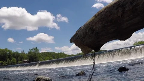 Log with Lehigh River Chain Dam in Background Stock Footage 76086646