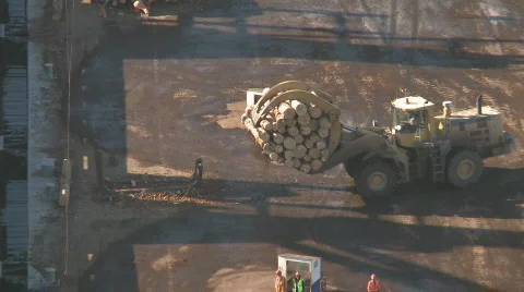 Log loader prepares logs for ship loading Stock Footage 862698