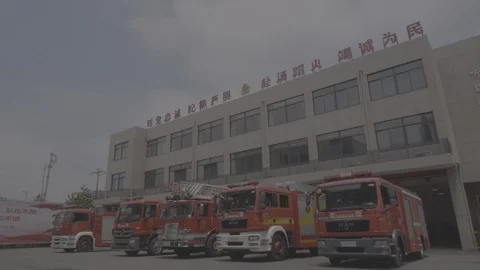 Log mode time lapse of fire station with fire engines Stock Footage 108989236