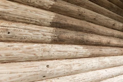 Log sanding is in progress, weathered timber logs perspective 写真素材
