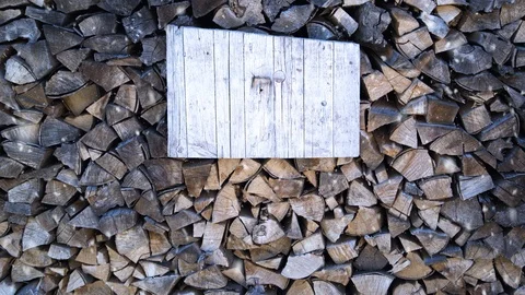 Log store detail during snowfall Stock Footage 116835204