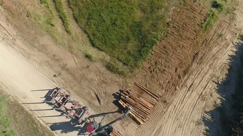 Log truck load tree trunks aerial top do... | Stock Video | Pond5