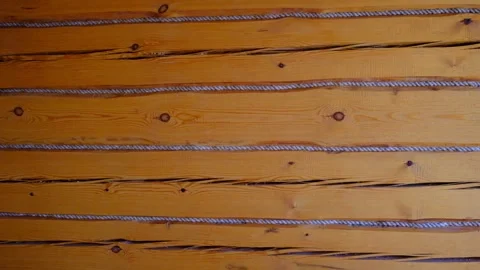 Log wall with jute insulation. Old village house, Old logs Stock Footage 337956929