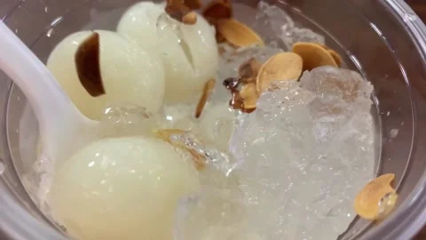 Logan in syrup dessert Stock Footage 164759661