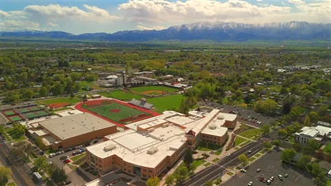 Logan Utah Smooth Aerial Approach Over School Campus Stock Footage 339092753