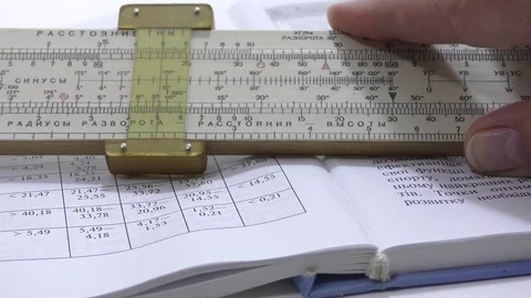 Logarithmic ruler. book. arm Stock Footage 108631562