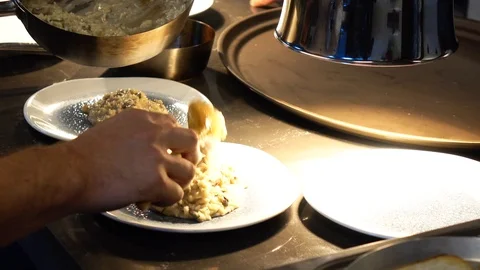 Loggia 05yeni cooking risotto at a restaurant Stock Footage 100039129