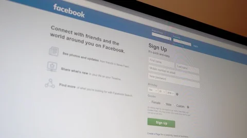 Logging in to facebook.com on a desktop computer Video stock 121992702