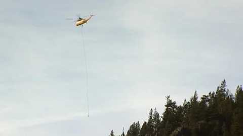 Logging Helicopter Above Forest in Western Montana Stock Footage 106057404