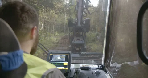 Logging machine  moves through the forest to the place of work Stock Footage 105973593