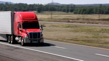 Logging Truck Driving Down Highway Stock Footage 85863934