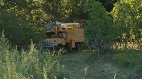 Logging Trucks Leave Field 库存影片 12114730
