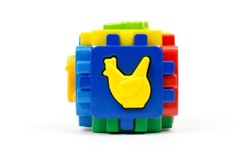 Logic sorter cube with plastic figures of animals Stock Photos