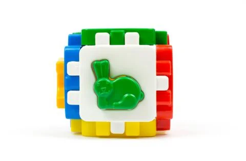 Logic sorter cube with plastic figures of animals Stock Photos