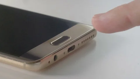 Login on a smart phone with fingerprint reader Stock Footage 81355579