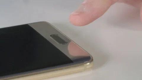 Login on a smart phone with fingerprint reader Stock Footage 81355650