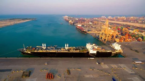 Logistic container ship at shipping yard main transportation of cargo Stock Photos