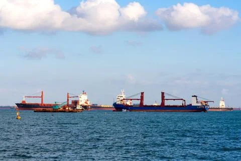 Logistic container ship at shipping yard main transportation of cargo Photos