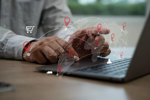 Logistic import export  man is using a laptop with a map of the world on th.. Foto stock