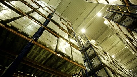 Logistic warehouse. Pallets on logistic warehouse shelves Stock Footage 133290744