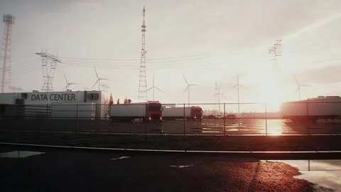 Logistics of AI hardware delivery to data center infrastructure. sunset Stock Footage 336345082