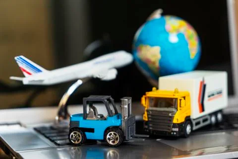 Logistics and supply chain management for online shopping concept: globe, whi Stock Photos