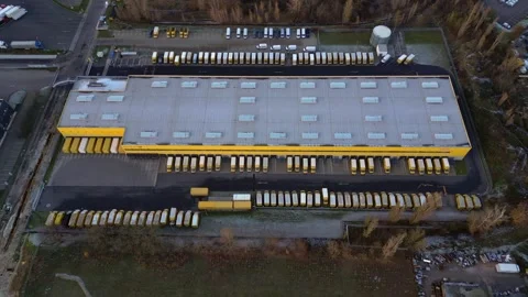 Logistics center, delivery vans distribution. Gorgeous aerial view flight drone Stock Footage 321820101