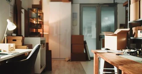 Logistics, empty or boxes in office building, interior or stock space in sm.. Stock Photos