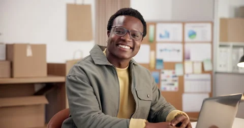 Logistics, face and black man in office with laptop, confidence and pride as Stock Footage 345705536