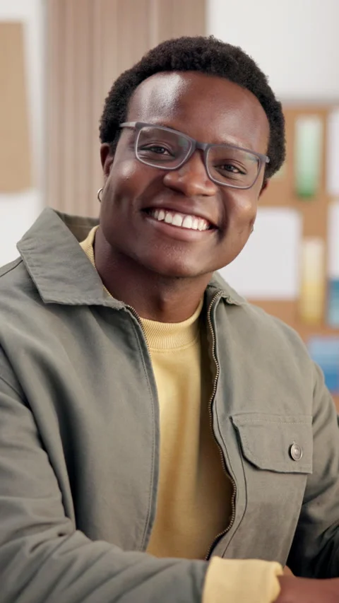 Logistics, face or black man in agency with smile, confidence or pride as Stock Footage 346774249